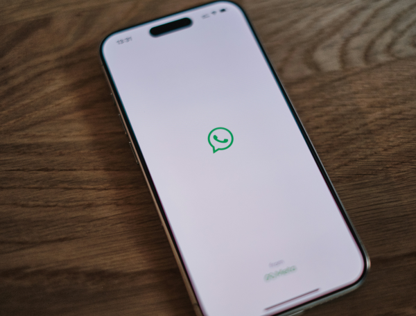 WhatsApp Business Authenticator OTP verification demo on a smartphone